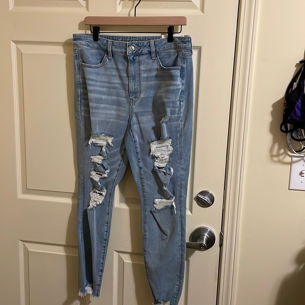 American Eagle Light wash ripped jeans Size 14 regular